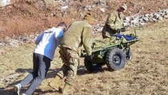 A team from Air Force Medical Command’s operational test organization, A5T, runs a steep incline test on the Silent Tactical Energy Enhanced Dismount