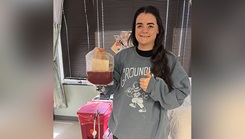 U.S. Army 2nd Lt. Jillian Walsh smiles for picture after donating bone marrow.