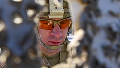 Army Reserve Sgt. Brian Heisey, a medical logistics specialist with the Nashville, Tenn. based Headquarters and Headquarters Detachment, Southeast Medical Area Readiness Support Group, inspects his shot group of a paper target at the M4 Carbine zero course during the Best Squad Competition 2025 led by the Pinellas Park