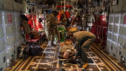 U.S. Air Force Airmen assigned to the 908th Aero-Medical Evacuation Squadron and 71st Rescue Squadron execute an aero-medical evacuation training at Maxwell Air Force Base