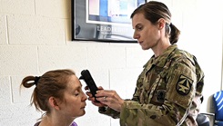 U.S. Army Maj. Dana Bal tests a brain hemorrhage detection device during familiarization training at the headquarters of the U.S. Army Medical Materiel Development Activity, Fort Detrick, Maryland. (Photo by T. T. Parish, U.S. Army Medical Material Development Activity)