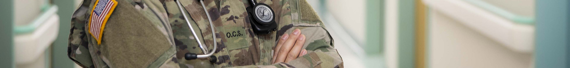 Officer Candidate Melissa Lewis, a student with the Phase II Interservice Physician Assistant Program at Landstuhl Regional Medical Center, is pictured in the Orthopedic Clinic at LRMC. Lewis was recently involved in emergency situations during a six-hour flight from Israel to Portugal, where her medical expertise led to stabilizing distressed passengers along with a New Hampshire physician.