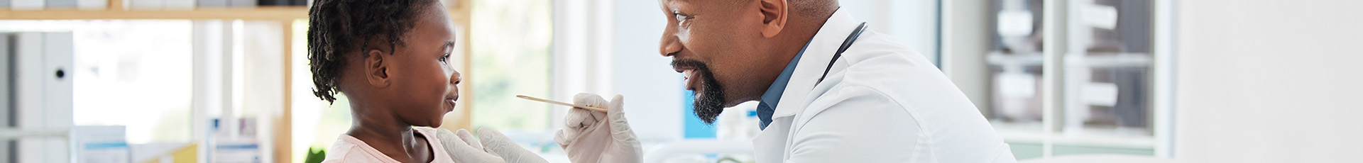 doctor with a patient doing a check up, stock photo