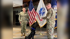 The Uniformed Services University of the Health Sciences (USU) facility dog program recently expanded with the addition of an enthusiastic two-year-old Labrador retriever named Grover. Grover officially reported for duty at USU during an enlistment ceremony on campus Feb. 28, where he was made an Army sergeant and combat medic in honor of the role and contributions of enlisted personnel at the university. 