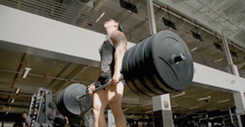 Military personnel lifting weights