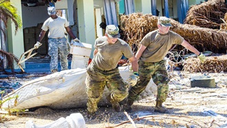 Link to Video: Military personnel helping clean up during a natural disaster